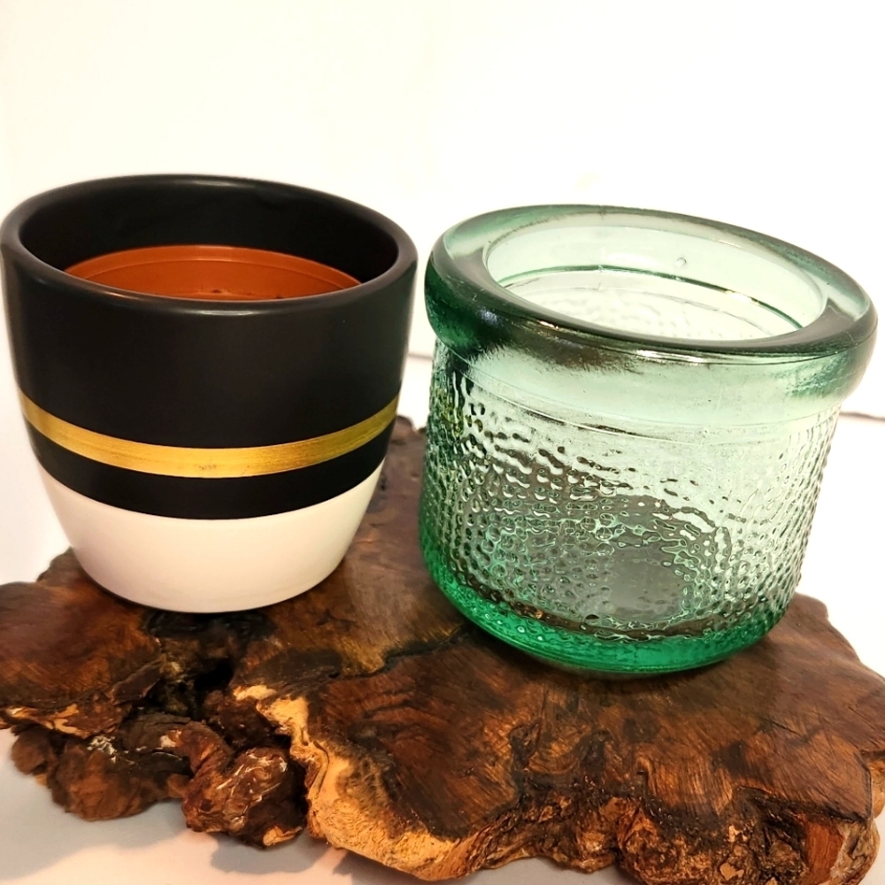 Lot 2 succulent pots, black, white, and gold ceramic, and heavy green glass‎